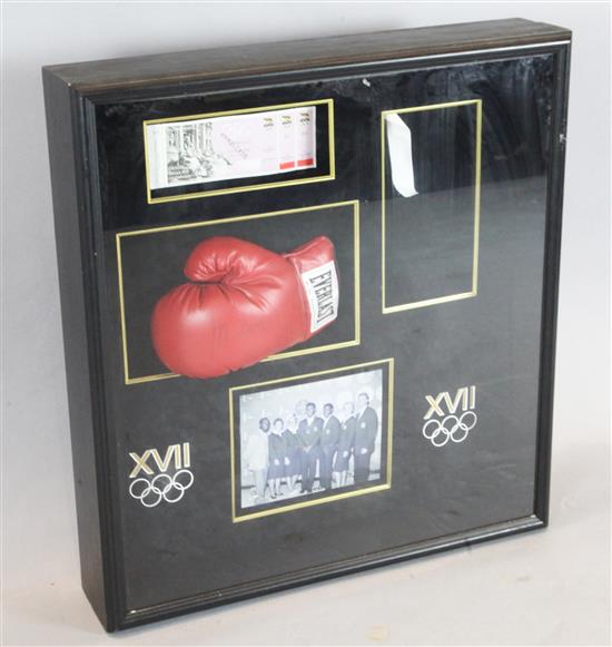 Muhammed Ali. A signed Everlast boxing glove, overall 2ft 9in. x 2ft 7in.